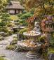 Preview: Wandbrunnen mit 2 Wasserbecken und Fisch Steinguss Zierbrunnen 105cm