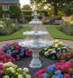 Preview: Gartenbrunnen mit Kreusblume Wasser Speier
