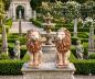 Preview: Löwen Gartenfigur sitzendes Löwenpaar links rechts Löwenfigur 53cm