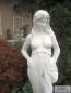 Preview: Garten Steinfigur Frau mit Blumen Kranz
