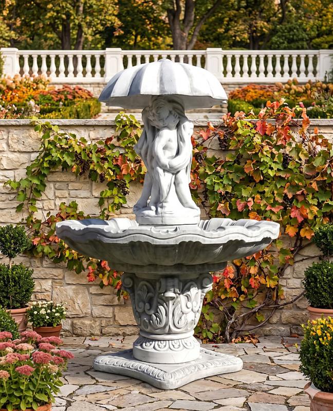 Schöner Garten Springbrunnen mit Kinter Gruppe unter dem Regenschim